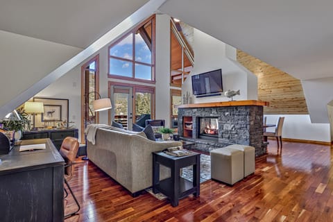 The unique living area is enhanced with contemporary mountain decor.