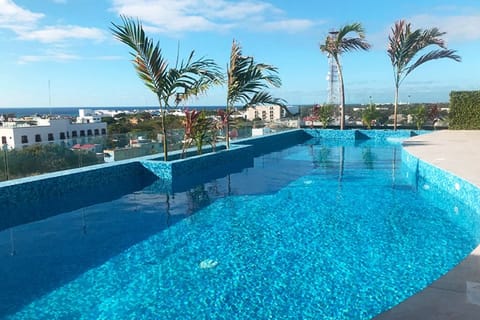 Enjoy a swim with a view at our chic rooftop pool.