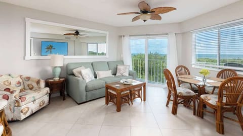 Spacious Living Room with Plentiful Seating & Dining Table 