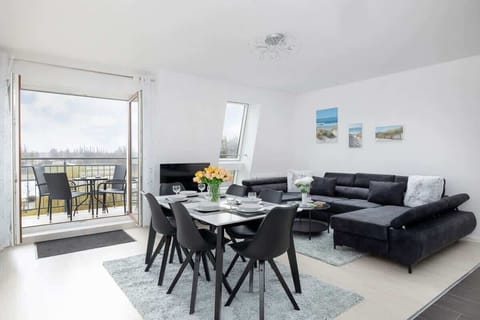 Living room of apartment Armii Krajowej 5/44 with table