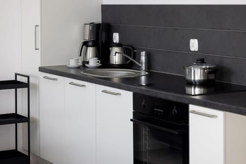 Kitchenette of apartment Armii Krajowej 5/44 with oven