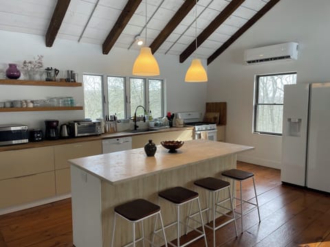 The kitchen space with a brand new fridge with water/ice dispenser
