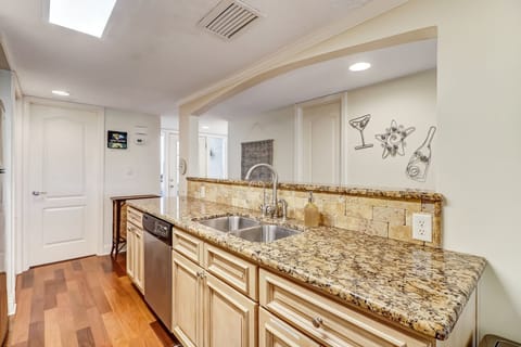 Fully Equipped Kitchen with Stainless Steel Appliances and Handsome Granite Countertops