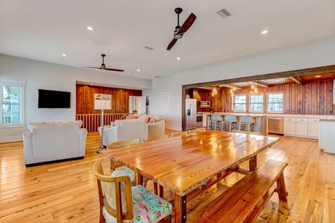 Magnificent Wood Dining Table with Seating for 10 and Unparalleled Oceanfront Views