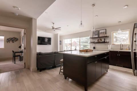 The home's open layout ensures that no one is ever left out of the fun.