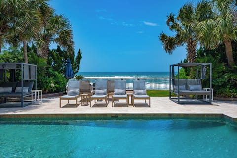 Oceanfront serenity meets poolside paradise.