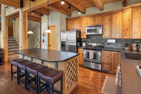 Kitchen, stocked with all cooking utensils, pots, glasses, seasonings, and more.