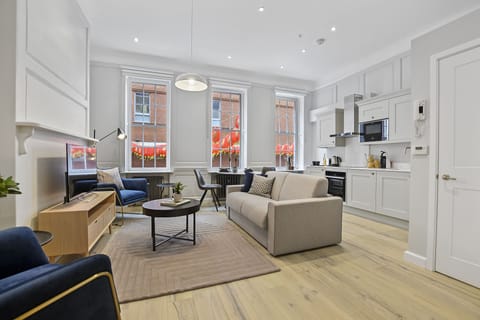 Business Apartment, 1 Double Bed | Living area | Flat-screen TV