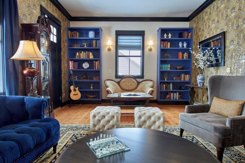 Upscale interior design throughout the house incorporates elements from the late 1800s with a bohemian flair, unique artwork, and modern-day conveniences.