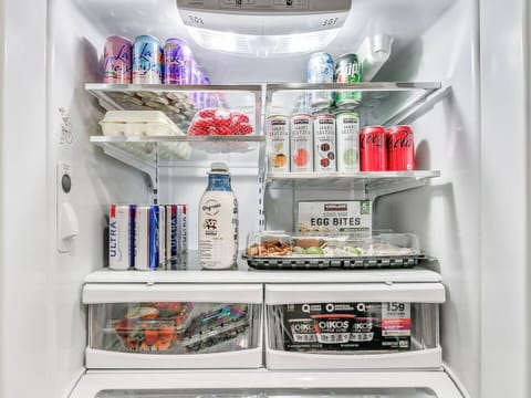 Simple, sleek, and fully stocked—this kitchen is just waiting for you to bring it to life. Ask about our *Fill the Fridge* package after booking!