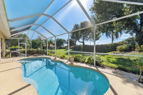 The heated pool receives warm sunlight and has a beautiful landscape surrounding it.  