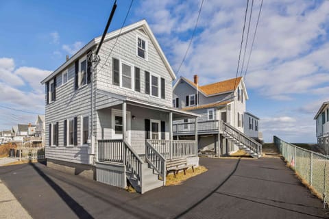 Your lodging in the front house. 30 second walk to beach at end of fence.