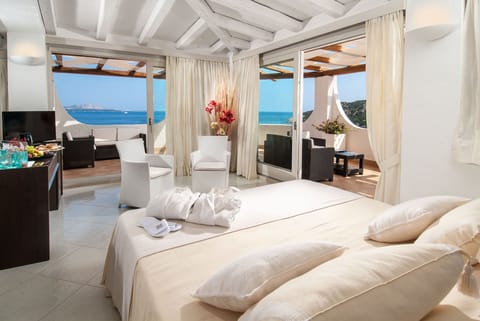 Deluxe Suite, Terrace, Sea View | Premium bedding, minibar, in-room safe, individually decorated