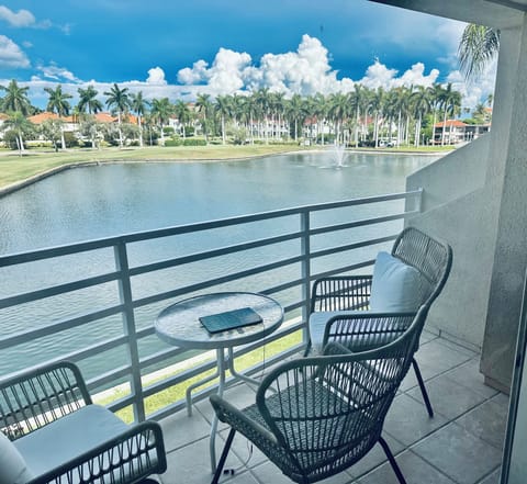 Patio overlooking golf course & lake 