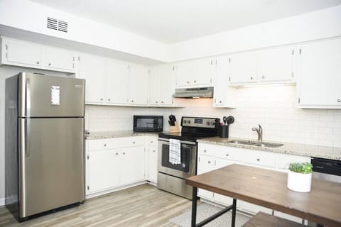 Stainless steel appliances and granite counter tops