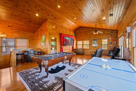 Private theater with 12 seats, air hockey, pool table, arcade with 60 games!