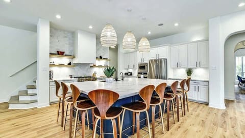 There is plenty of seating around the kitchen island