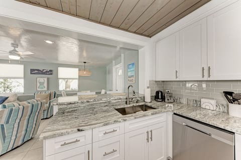 Kitchen facing towards the dining and family room