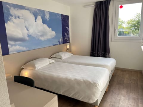 Standard Room, 2 Twin Beds | Memory foam beds, desk, laptop workspace, blackout drapes