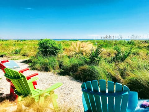 Your access to Gulf views: Relax in this comfortable seating area, one of many at Sanibel Siesta. Just steps from Unit 802, it's an ideal spot to enjoy the coastal scenery.