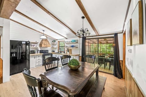 The screened in porch is just off of the kitchen.