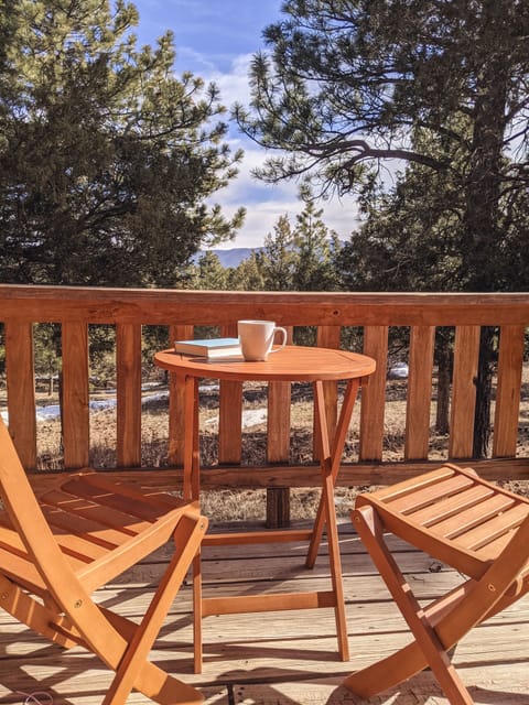 Private deck off the primary bedroom is the perfect place to enjoy a quiet moment