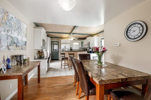 Experience the epitome of hospitality in our open-layout design. A spacious dining table and island seating create a welcoming atmosphere, ensuring everyone can enjoy the space comfortably. Perfect for gatherings, conversations, and shared moments in the heart of your home.