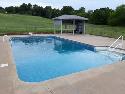 Large pool with covered hut. Weber grill with amenities. WiFi connected.