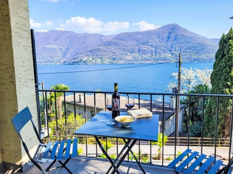 Furniture, Outdoor Furniture, Chair, Coastal And Oceanic Landforms, Balcony, Outdoor Table, Sea, Mountain Range, Coast, Shade