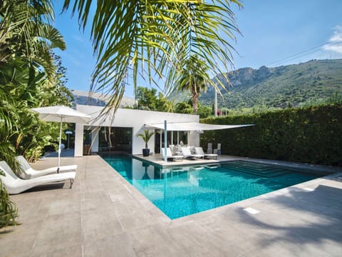 Sky, Water, Property, Swimming Pool, Plant, Building, Azure, Shade, Outdoor Furniture, Chair
