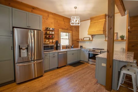 Updated Kitchen with Quartz Countertops and Stainless Appliances