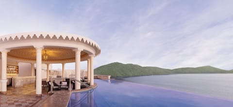 Outdoor pool, an infinity pool, free cabanas, sun loungers