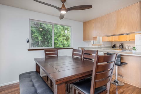 Dining table with extended leaf available.