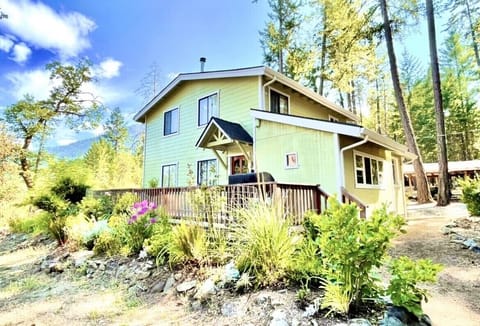 Entry to the home with access to a spacious deck
