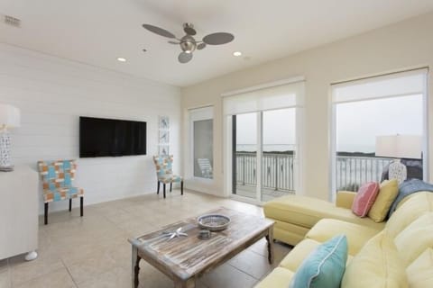 Our vacation home is a 3-story walk-up with 3 bayfront balconies.