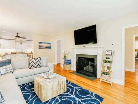 Spacious living space with 65' flat screen TV and free hi-speed WiFi.