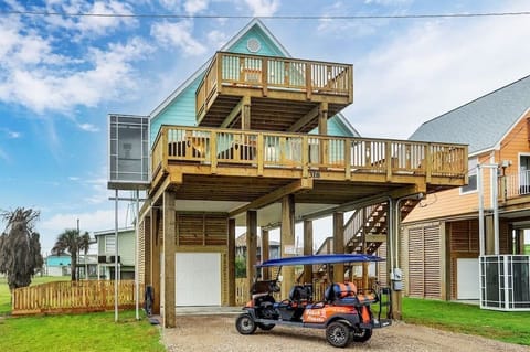 Front view of house. Ask about our low rates for the golf cart.