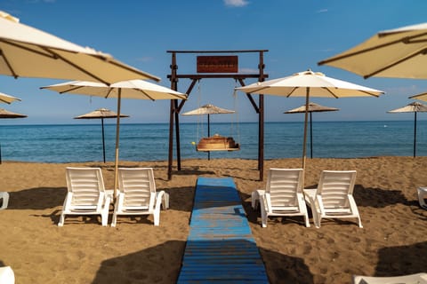 On the beach, free beach cabanas, sun loungers, beach umbrellas