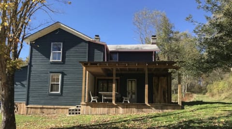 Farmhouse with porch/BBQ sofa and table