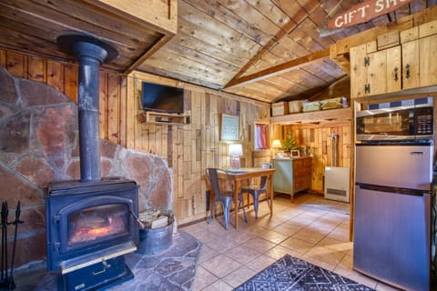 Inviting wood burning stove with complimentary firewood during your stay.