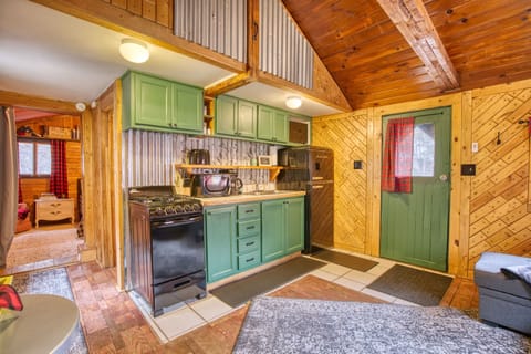 In addition to the woodstove - there is also a propane furnace, electric space heater, ceiling fan and box fan for your comfort.