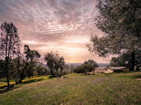 The sky puts on a show out here most evenings. Bring a chair, pour something cold.
