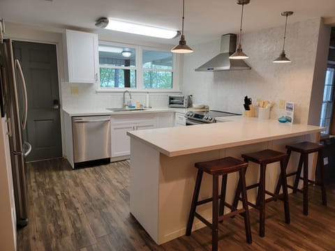 Wash dishes with a lake view or just use the dishwasher.  You are on vacation!