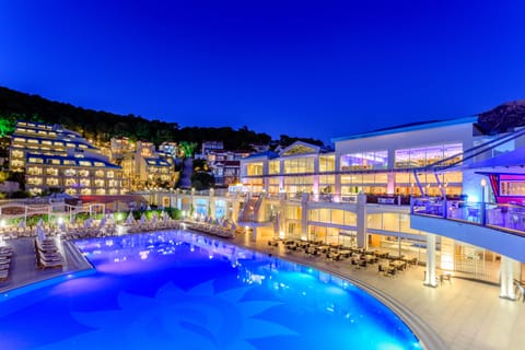 Indoor pool, outdoor pool, pool umbrellas, sun loungers