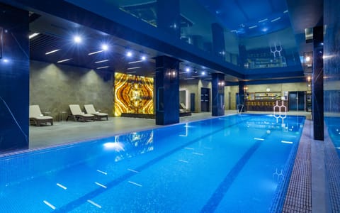 Indoor pool, open 7:00 AM to 11:00 PM, sun loungers