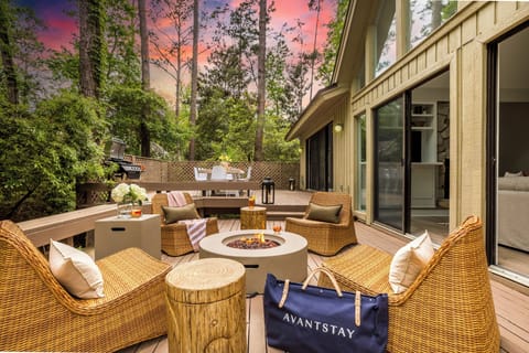 Spacious deck with fire pit.