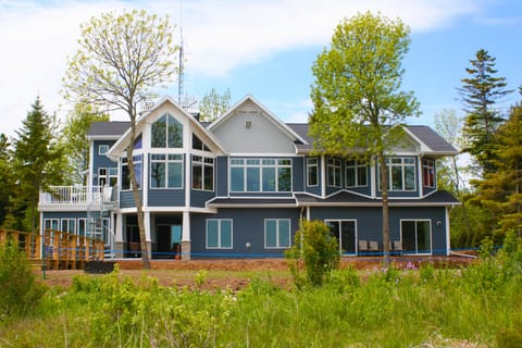 Spring at Cana Pointe - Exterior of Home-facing Lake Michigan
