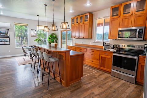 Chef's kitchen with every cooking amenity and tons of storage space