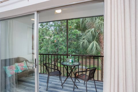 Sliding doors off the living room to your private balcony