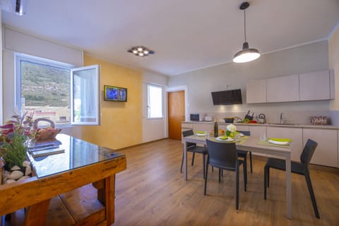 The cozy living room with the dining table
